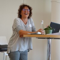 women smiling into the camera