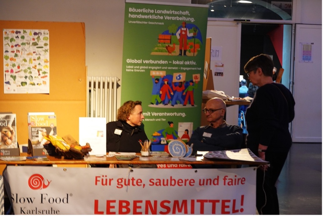 Photo of various information booths and people