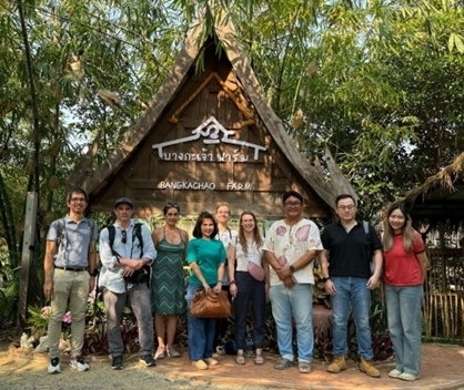 team in front of the Bangkachao Organic Farm building 